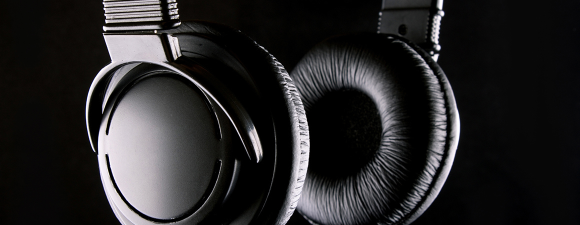 Studio lighting rig against a dark backdrop