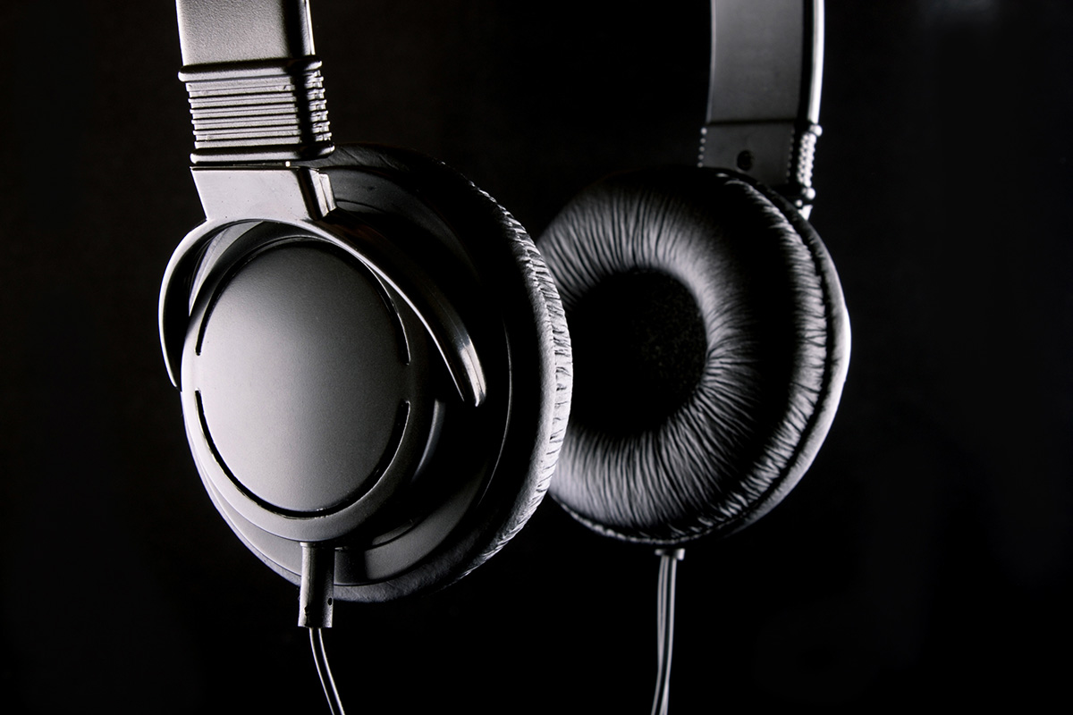 Black Stage: studio headphones, close crop of the ear cup